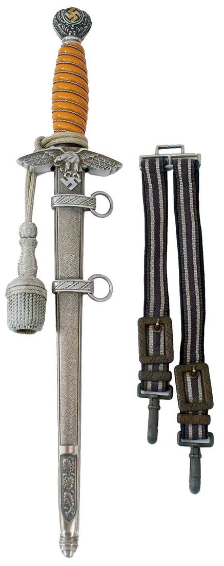 A THIRD REICH SECOND PATTERN LUFTWAFFE OFFICER'S DAGGER,: 25.5cm flattened diamond section blade by Eickhorn of Solingen, regulation alloy hilt with wire bound orange celluloid grip, in its stippled steel scabbard complete with knot and straps.