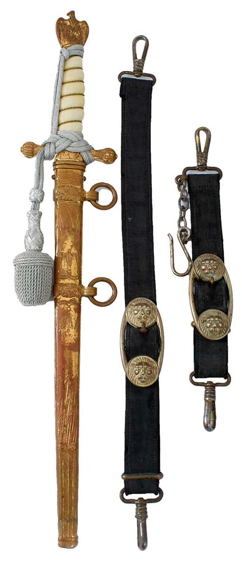 A THIRD REICH KRIEGSMARINE OFFICER'S DAGGER,: 25cm flattened diamond section double fullered clean blade by Eickhorn, etched with foliage and naval motifs on a matt grey ground, regulation gilt brass hilt, wire bound celluloid grip, in its engrav