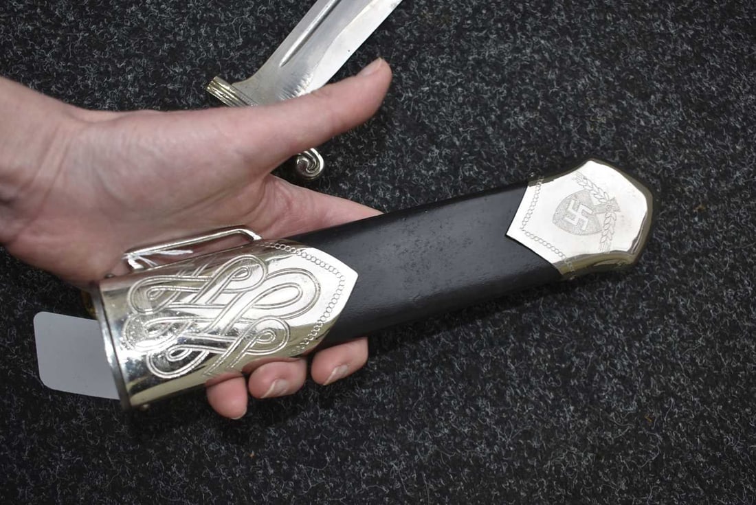 A THIRD REICH RAD HEWER, - 10