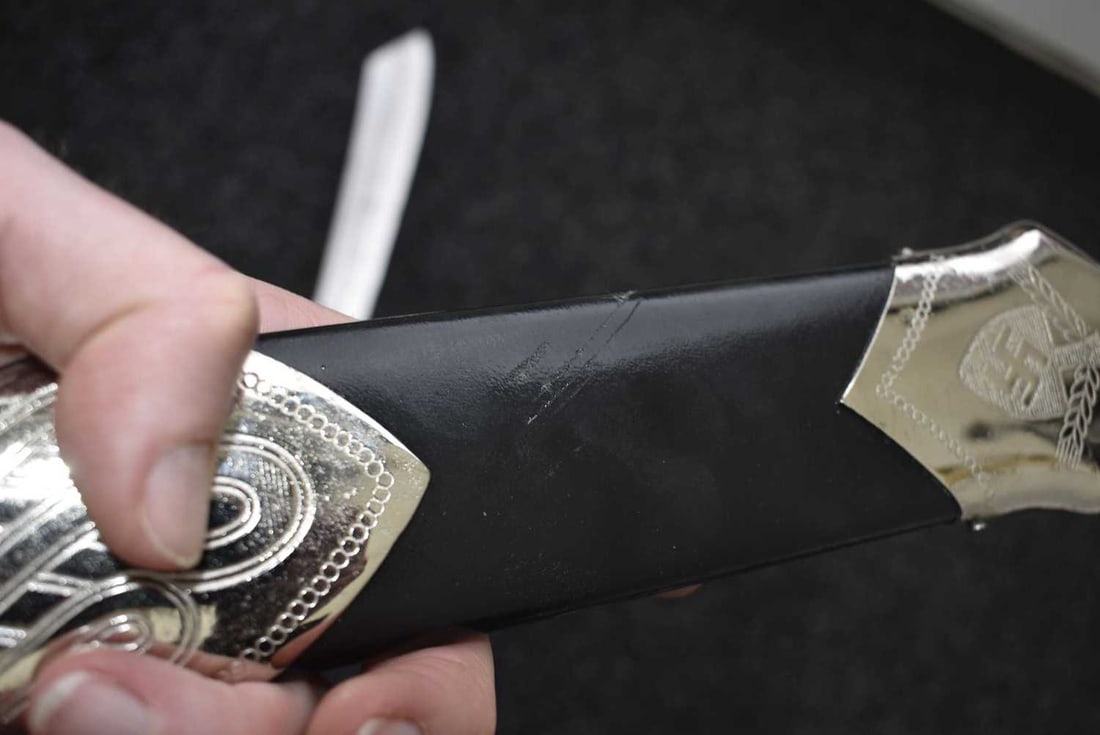 A THIRD REICH RAD HEWER, - 12