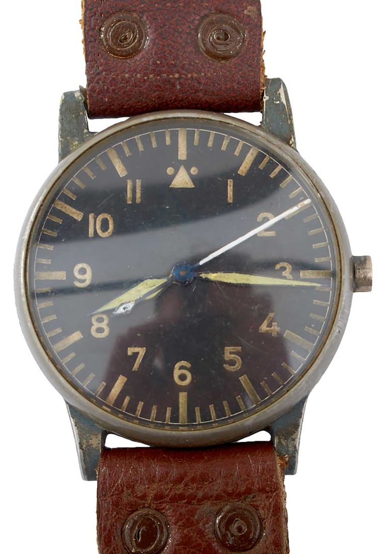 A SCARCE SECOND WAR PERIOD THIRD REICH LUFTWAFFE OBSERVER'S WATCH,: maker marked for A. Lange & Sohne, serial no. F123883. Sold with a selection of paperwork relating to this type of watch. Winder detached but present.