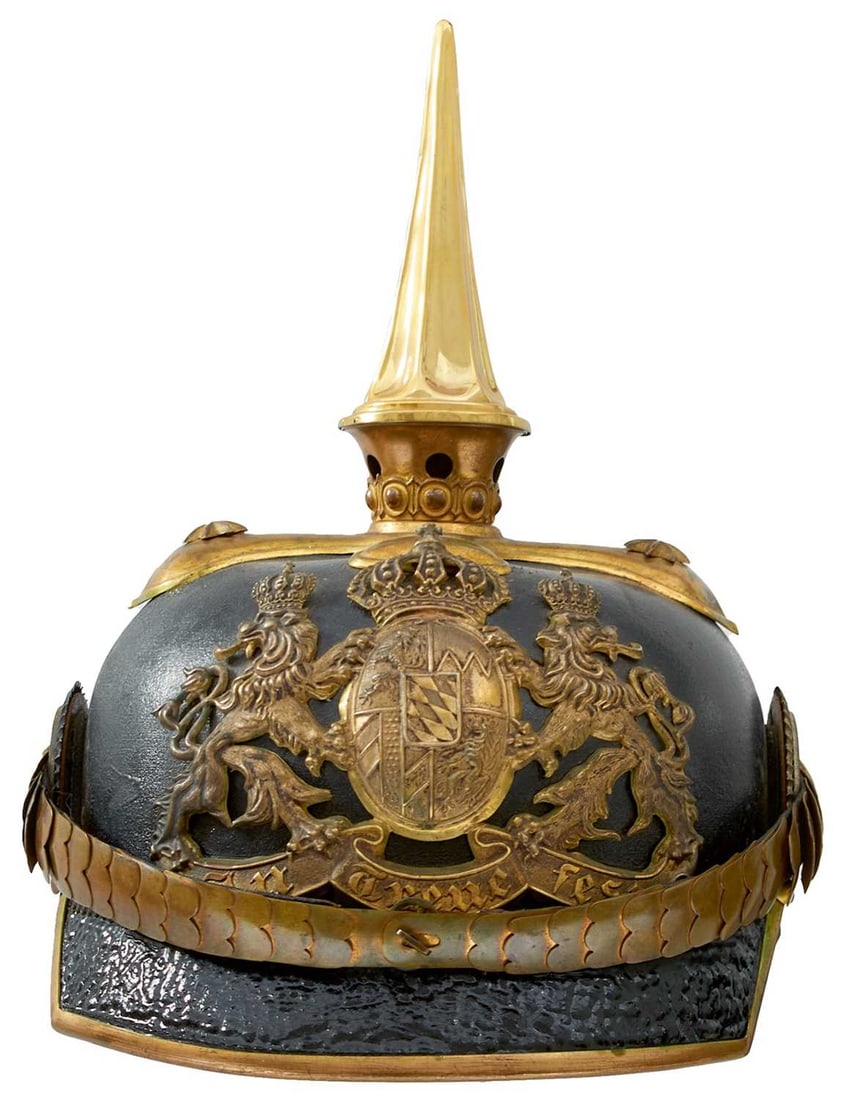 A BAVARIAN NCO'S PICKELHAUBE,: the black leather skull with brass fittings, white metal Bavarian State helmet plate, fluted spike finial with quatrefoil base secured with star topped rivets, Imperial and State cockades, cloth