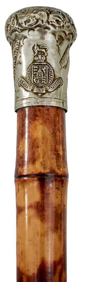 A 19TH CENTURY SWORD STICK,: possibly with Masonic associations, 58cm tapering blade with etched decoration to include Jacob's ladder, a bird, the cross of Lorraine and foliage, the white metal pommel with the crest of King's