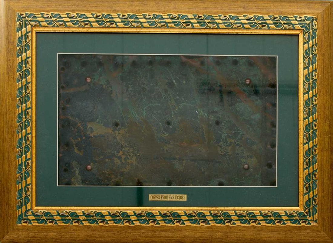 OF TRAFALGAR AND NELSON INTEREST: A FRAMED SHEET OF HMS VICTORY COPPER HULL COVERING,: approximately 14inches x 8.5 inches, framed and glazed, complete with certificate confirming this is just no. 164 of 500 sheets so framed.