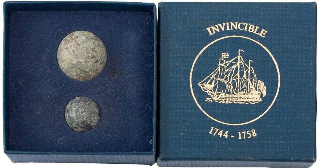THREE BRASS NAILS FROM THE HULL OF HMS VICTORY,: complete with certificate, together with, two musket or cannon flints, a musket and pistol ball with certificates pertaining to HMS Invincible, a musket ball from HMS Crocodile with certificate, and