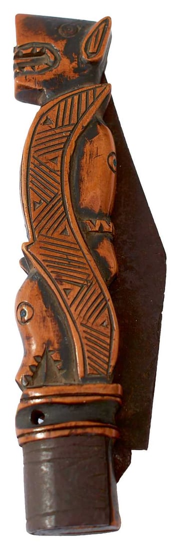 A GOOD 19TH CENTURY NATIVE AMERICAN INDIAN TRADE CLASP KNIFE,: 7.5cm clipped back blade, well carved wooden grips in the manner of a wolf's heads, horse's head and a hound's head.