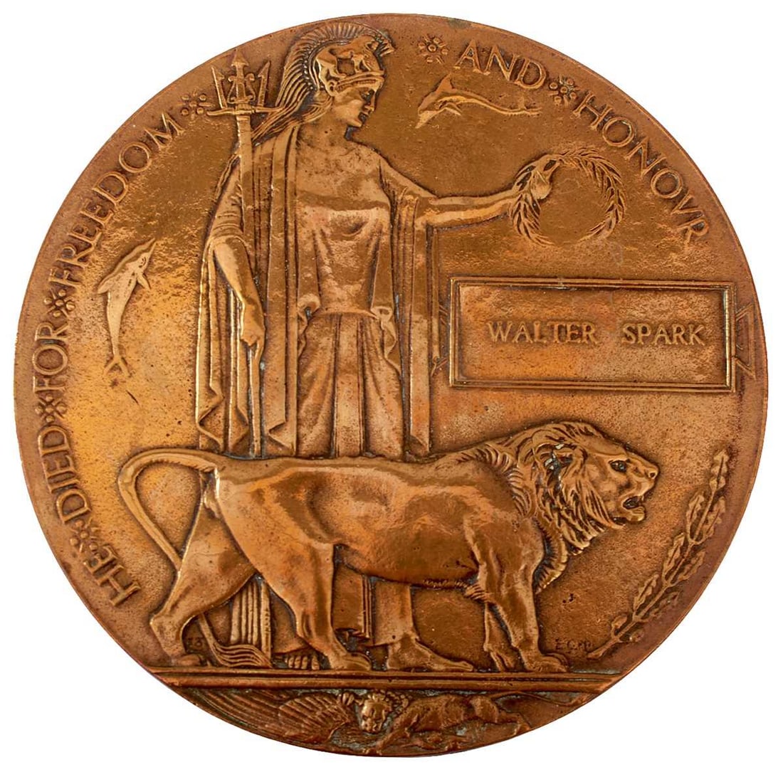 A FIRST WAR DEATH PLAQUE TO WALTER SPARK,: Walter Herbert Spark served with the 1st/4th Batallion Northumberland Fusilers and was killed on the 15th September 1916, together with a copy Uhlan cloth and bullion top wrap. (2)