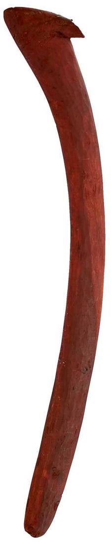 A LATE 19TH CENTURY CARVED WOODEN ABORIGINAL HUNTING BOOMERANG,: red painted stone carved body, 83cm over all, together with a court sword and a selection of swagger and other sticks. (Parcel)
