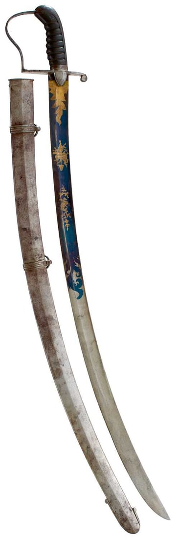 A 1796 PATTERN LIGHT CAVALRY OFFICER'S SABRE,: A 1796 PATTERN LIGHT CAVALRY OFFICER'S SABRE, 81.5cm curved fullered blade decorated with scrolling foliage, flowerheads, a stand of arms and an Eagle's head to one side of the forte, all highlighted