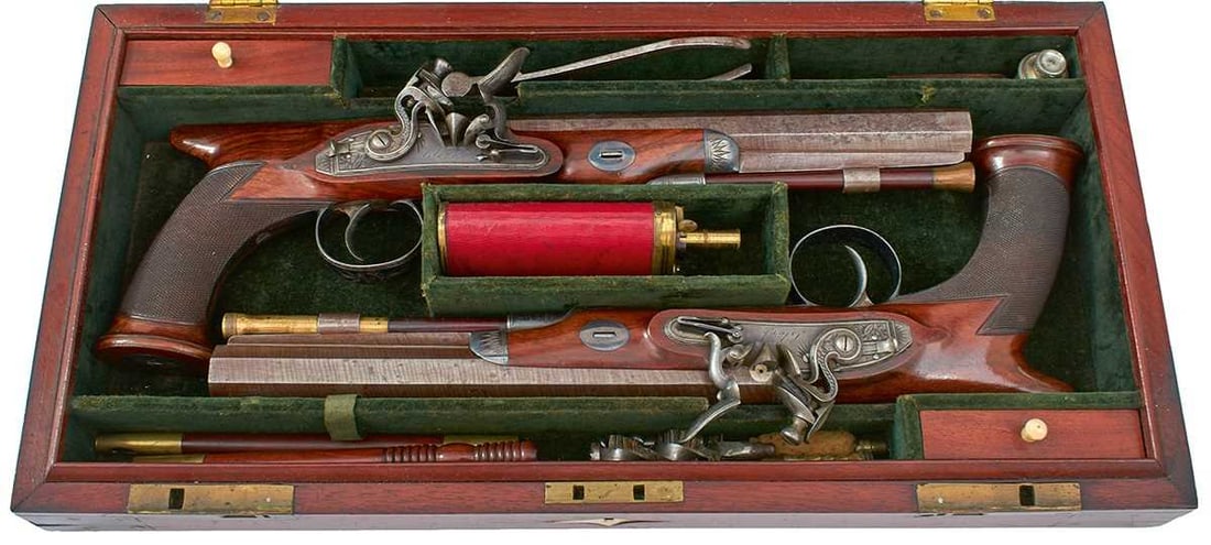 A CASED PAIR OF 28-BORE FLINTLOCK SAW-HANDLED DUELLING PISTOLS BY CLARK OF LONDON, (1 of 20)