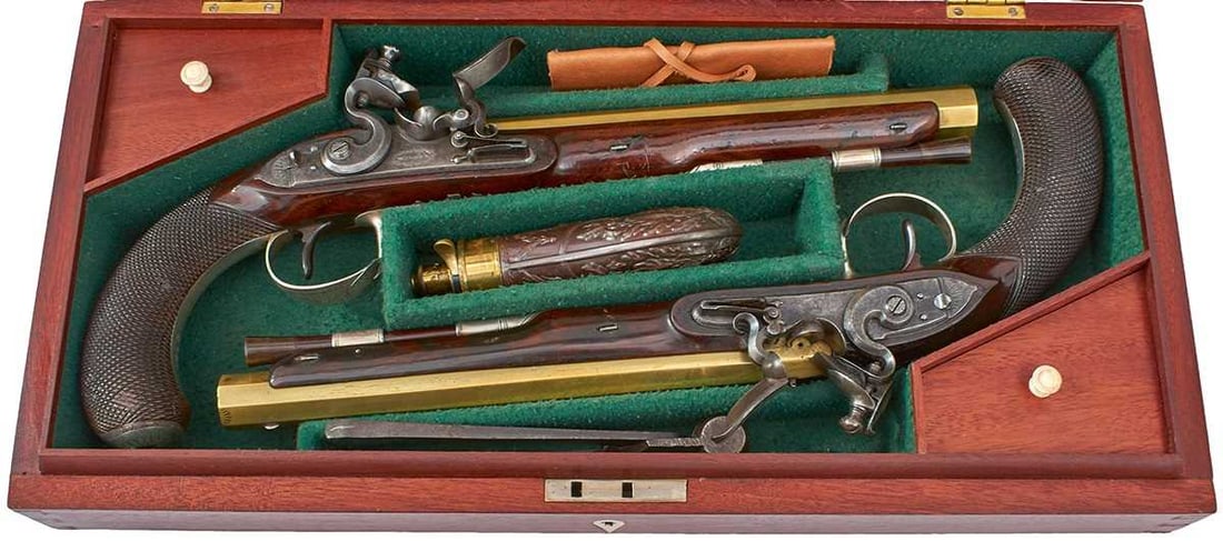 A LATER CASED PAIR OF CRISP 20-BORE FLINTLOCK SILVER MOUNTED OFFICER'S PISTOLS BY WILSON, (1 of 20)