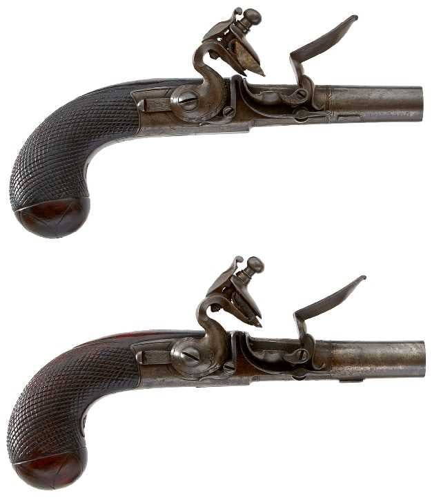 A PAIR OF 50-BORE FLINTLOCK POCKET PISTOLS BY H.W. MORTIMER,: A PAIR OF 50-BORE FLINTLOCK POCKET PISTOLS BY H.W. MORTIMER, 1.5inch turn-off barrels chevron engraved at the bases, the breeches engraved H.W. MORTIMER LONDON GUN MAKER TO HIS MAJESTY in scroll banne