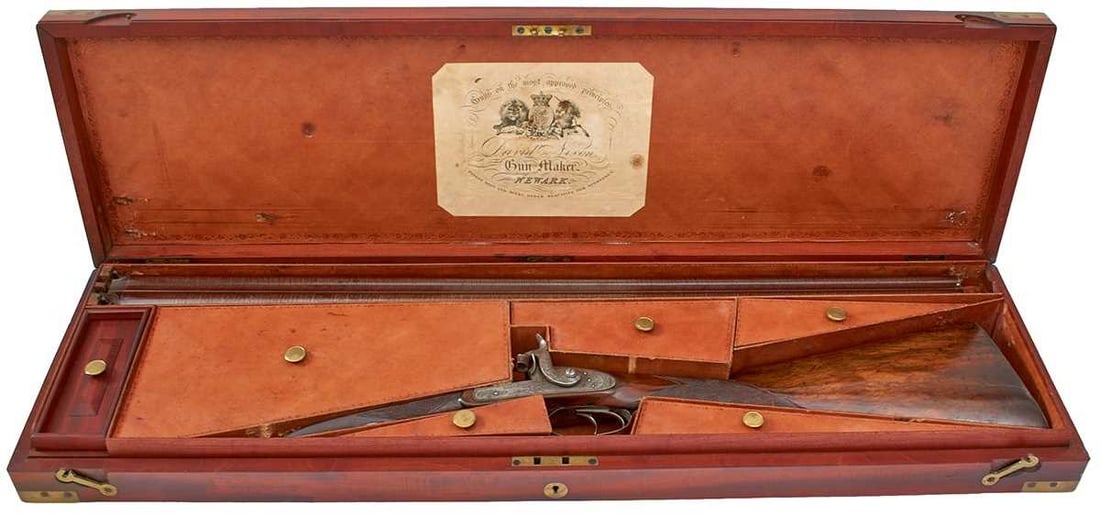 A CASED 12-BORE DOUBLE BARRELLED PERCUSSION SPORTING GUN BY NIXON OF NEWARK,: A CASED 12-BORE DOUBLE BARRELLED PERCUSSION SPORTING GUN BY NIXON OF NEWARK, 30.75inch sighted browned damascus barrels engraved NIXON GUNMAKER NEWARK in the sighting rib, border and scroll engraved s