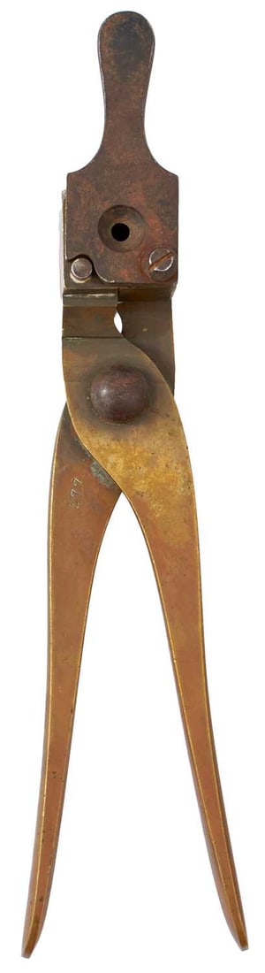 A .458 CALIBRE BULLET MOULD,: A .458 CALIBRE BULLET MOULD, the brass arms stamped FOR BREECH LOADING and .458-.468 - 480, together with a further brass rifle mould of .577 calibre. (2)
