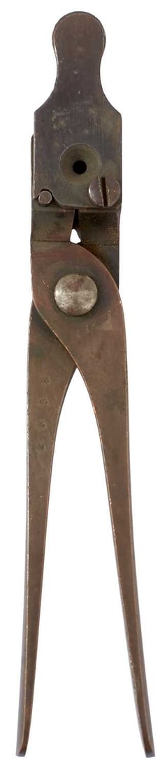 A .500 CALIBRE RIFLE BULLET MOULD,: A .500 CALIBRE RIFLE BULLET MOULD, the brass arms stamped with the serial no. 2338, sprue cutter, together with another of .340 calibre and with steel arms. (2)