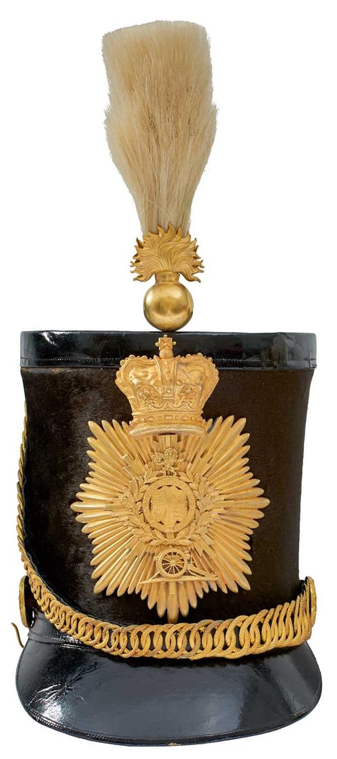 A RARE MADRAS ARTILLERY OFFICER'S ALBERT PATTERN SHAKO,: A RARE MADRAS ARTILLERY OFFICER'S ALBERT PATTERN SHAKO, the black fur body with patent leather top, peak and neck guard, large gilt crowned rayed star helmet plate surmounted with a further rayed star