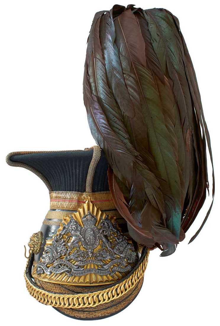 A GVR 16TH (QUEEN'S) LANCER'S OFFICER'S CAP,: A GVR 16TH (QUEEN'S) LANCER'S OFFICER'S CAP, the black leather body with bi-metal GVR 16th Lancers rayed helmet plate, crowned Royal arms surmounting scroll banner battle honours above the regimental 