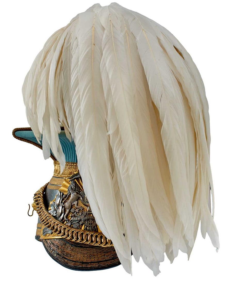 AN EDWARDIAN 21ST (EMPRESS OF INDIA'S) LANCER'S OFFICER'S CAP,: AN EDWARDIAN 21ST (EMPRESS OF INDIA'S) LANCER'S OFFICER'S CAP, the black leather body with bi-metal GVR 16th Lancers rayed helmet plate, crowned Royal arms surmounting centered in a laurel wreath abov