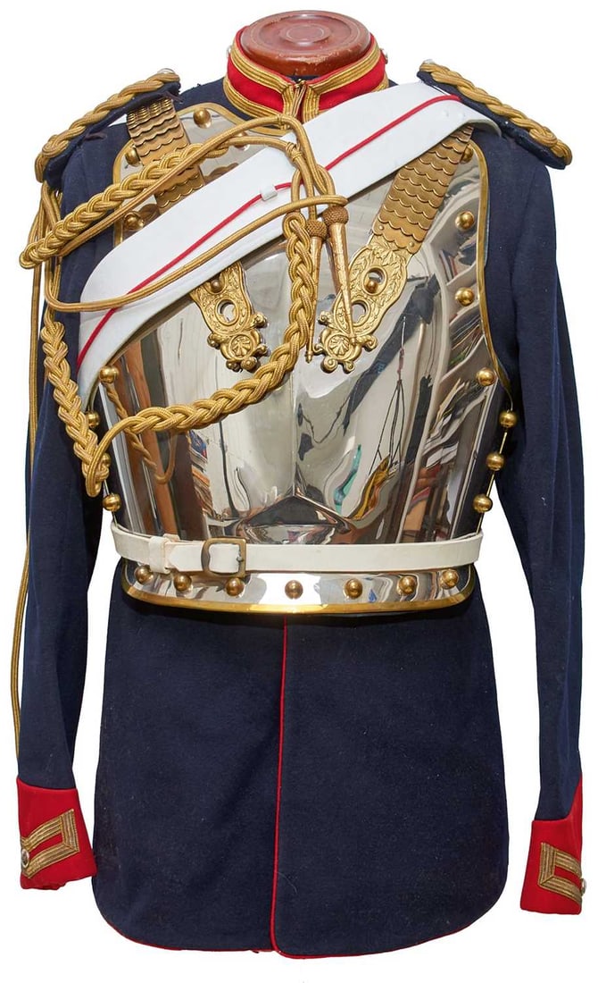 A ROYAL HORSE GUARDS BREAST AND BACK PLATE UNIFORM ENSEMBLE,: A ROYAL HORSE GUARDS BREAST AND BACK PLATE UNIFORM ENSEMBLE, the blue tunic with red collar and cuffs with bullion trim, gilt bullion shoulder boards and aiguillette, brass trimmed polished metal cuir