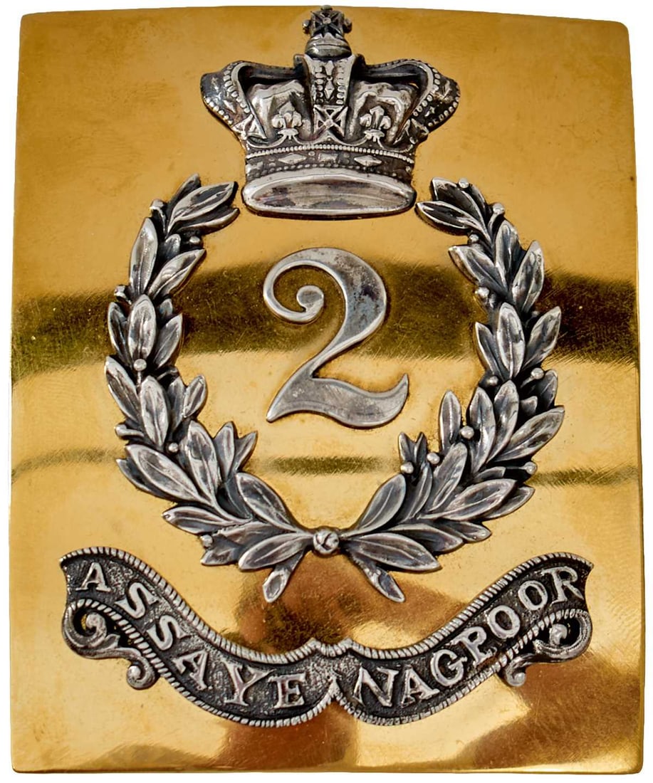 OF INDIAN ARMY INTEREST: A 2ND (MADRAS NATIVE INFANTY) OFFICER'S SHOULDER BELT PLATE,: OF INDIAN ARMY INTEREST: A 2ND (MADRAS NATIVE INFANTY) OFFICER'S SHOULDER BELT PLATE, rectangular gilt plate applied with a white metal crown over 2 surrounded by laurel wreath, ASSAYE NAGPOOR on a ba