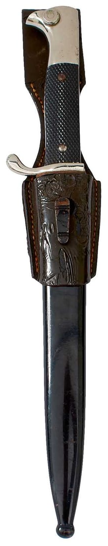 A THIRD REICH DRESS BAYONET,: A THIRD REICH DRESS BAYONET, 20cm fullered blade with double edged tip by EICKHORN OF SOLINGEN, regulation plated hilt with two-piece chequered celluloid grips, in its black painted steel scabbard