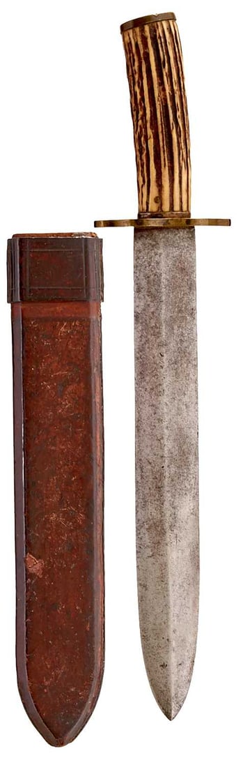 AN INDIAN BOWIE OR HUNTING KNIFE,: AN INDIAN BOWIE OR HUNTING KNIFE, 28.5cm spear-tipped blade, double edged towards the tip, characteristic hilt with shaped brass crossguard and brass pommel cap, natural stag's horn grip, in its leath
