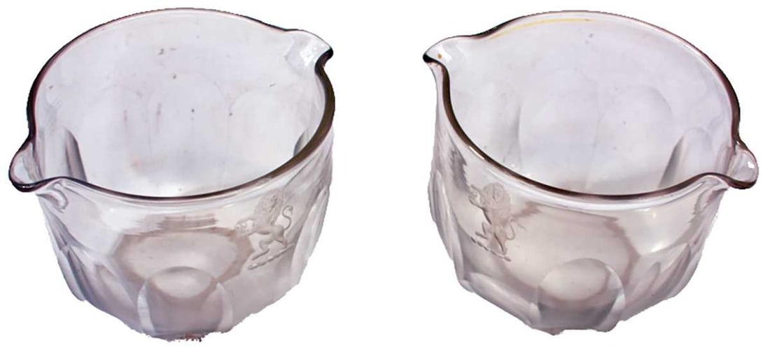 A PAIR OF 19TH CENTURY EAST INDIA COMPANY WINE GLASS RINSERS,: A PAIR OF 19TH CENTURY EAST INDIA COMPANY WINE GLASS RINSERS, each with double lipped edge above faceted decoration to the bowl and engraved with the East India Company lion rampant holding a crown, 9