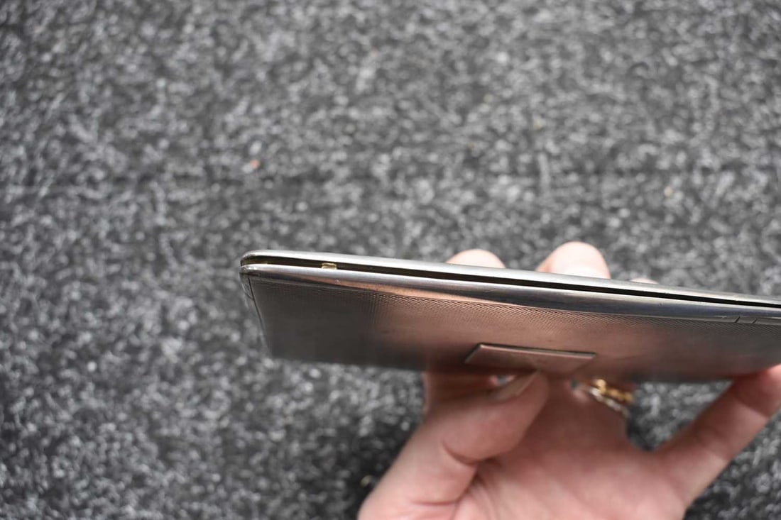 A WORLD WAR II V COMMANDOS SILVER CIGARETTE CASE, - 10