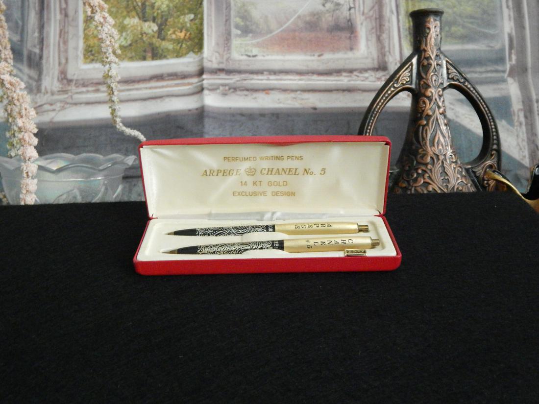 14K Gold Perfumed Pens: 2, 14K Gold Perfumed Pens, with a Red leather Case. Arpege Chanel No. 5, Exclusive design.