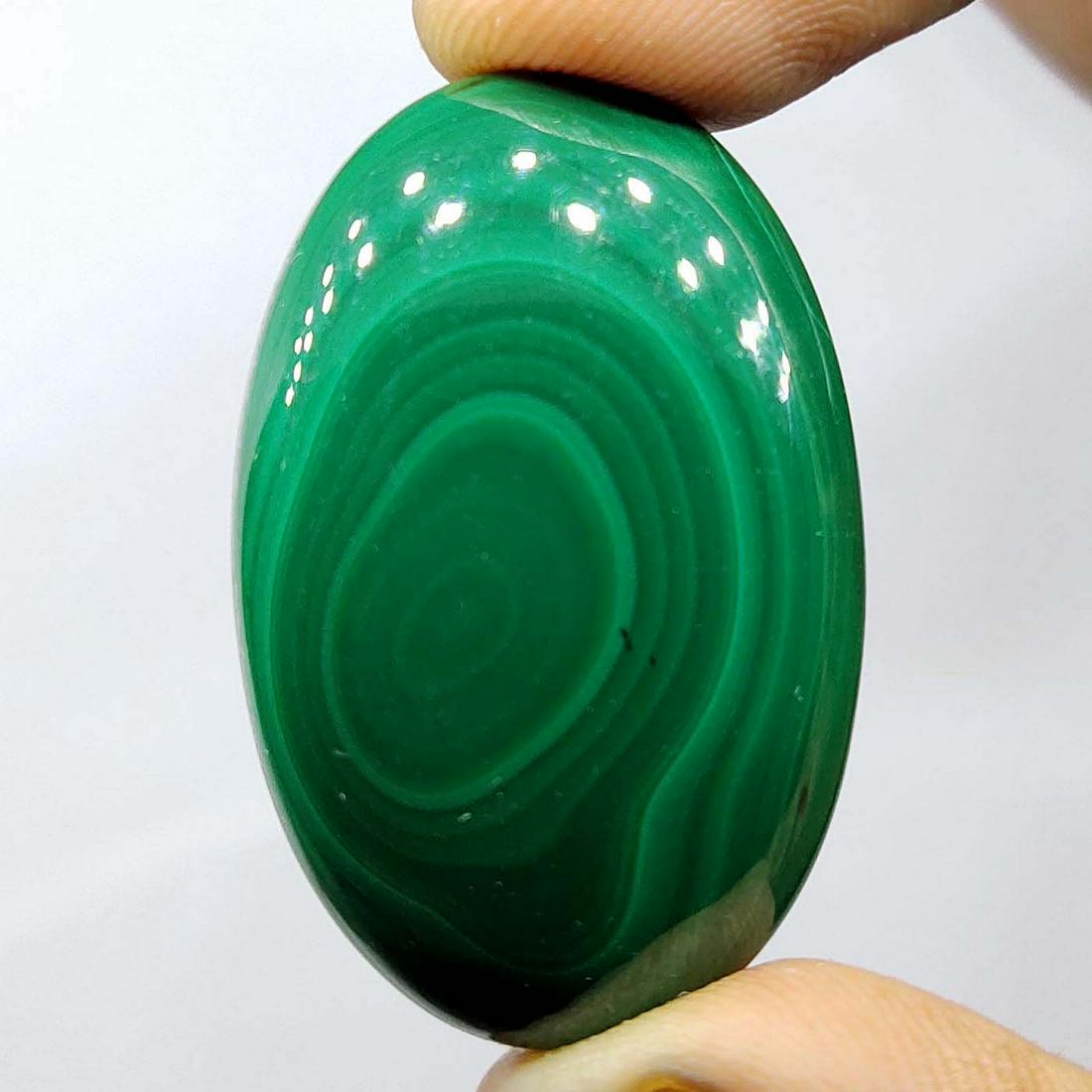 56.3 ct Natural Malachite: Natural Malachite with an exact weight is 56.3 ct.Top Quality stone