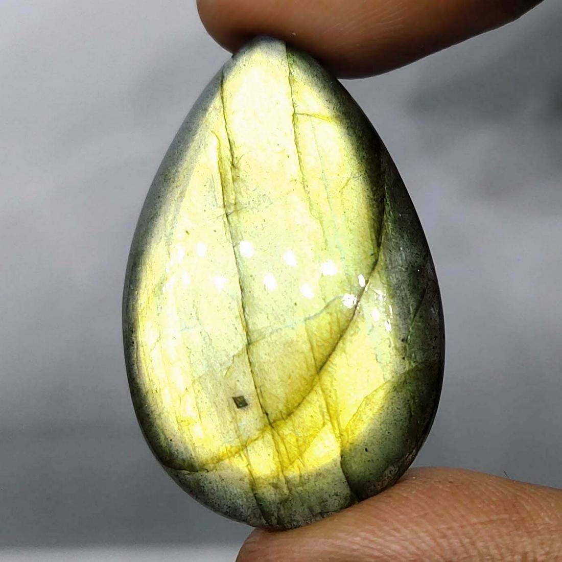 29.75 Ct Natural Green Labradorite: Natural Green Labradorite with an exact weight is 29.75 ct.AAA Quality stone