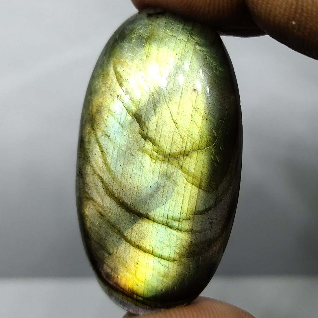 64.05 ct Natural Multi Labradorite: Natural Multi Labradorite with an exact weight is 64.05 ct.Top Quality stone