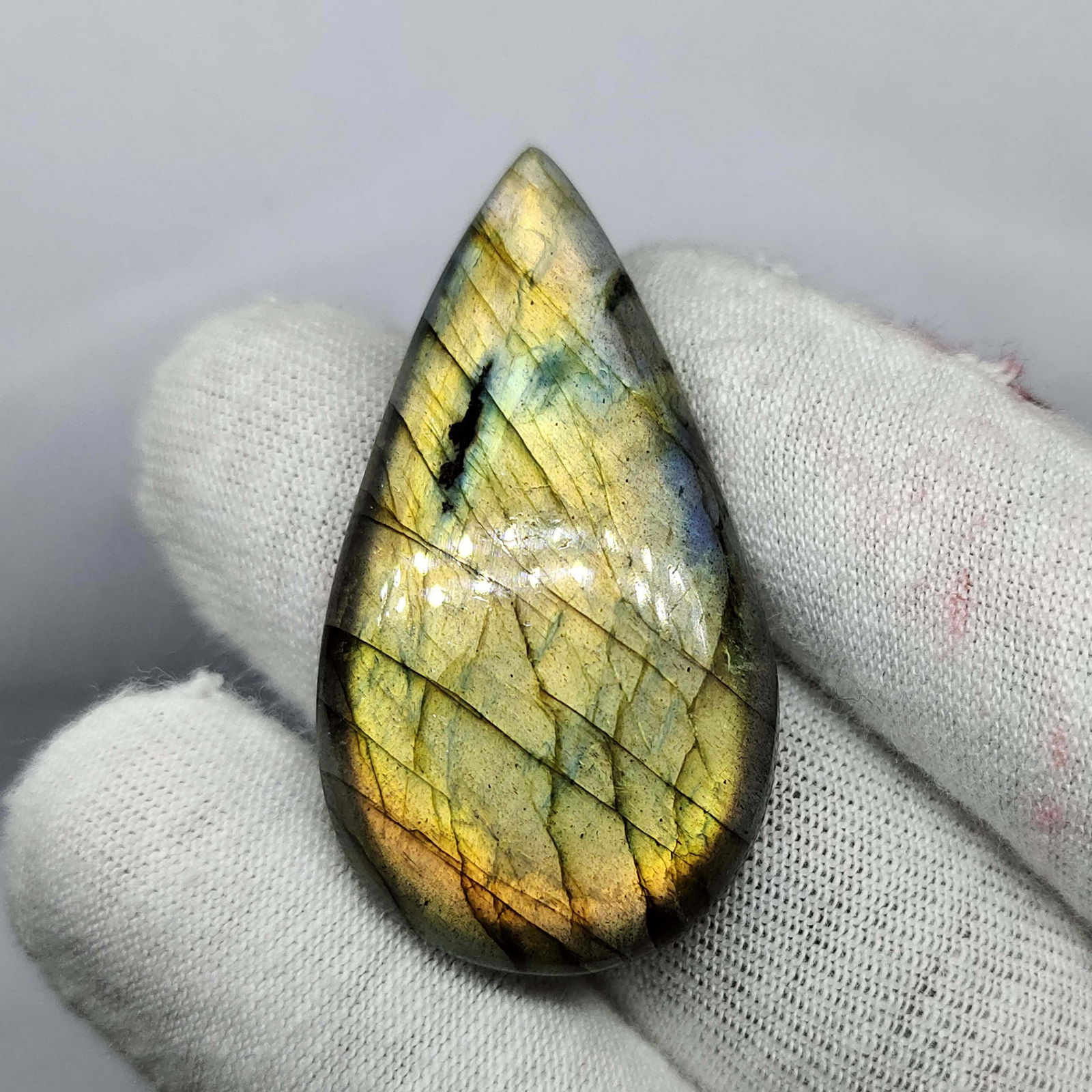 38.40 ct Natural Multi Labradorite: Natural Multi Labradorite with an exact weight is 38.40 ct.Top Quality stone