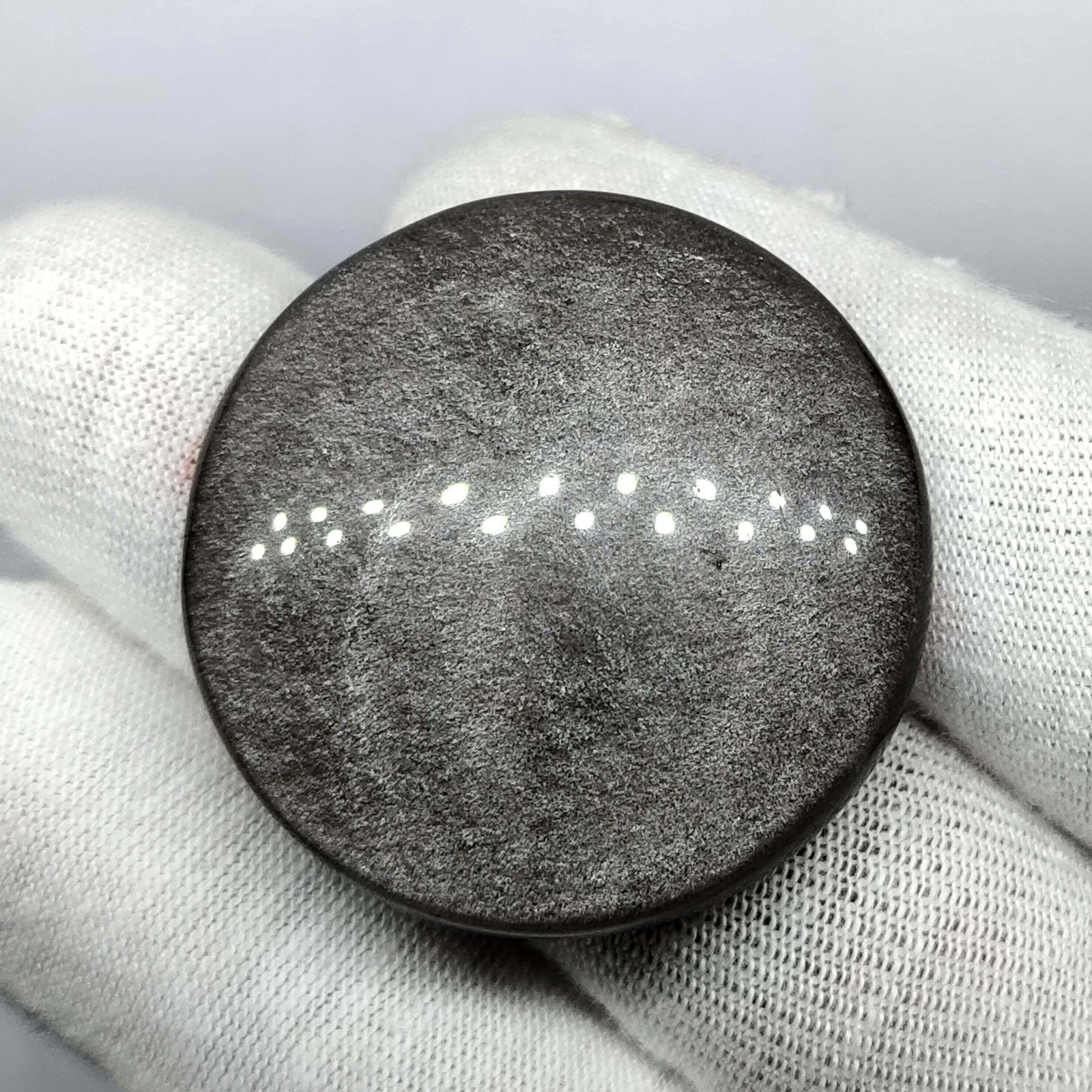 56.30 ct Natural Silver Obsidian (1 of 2)