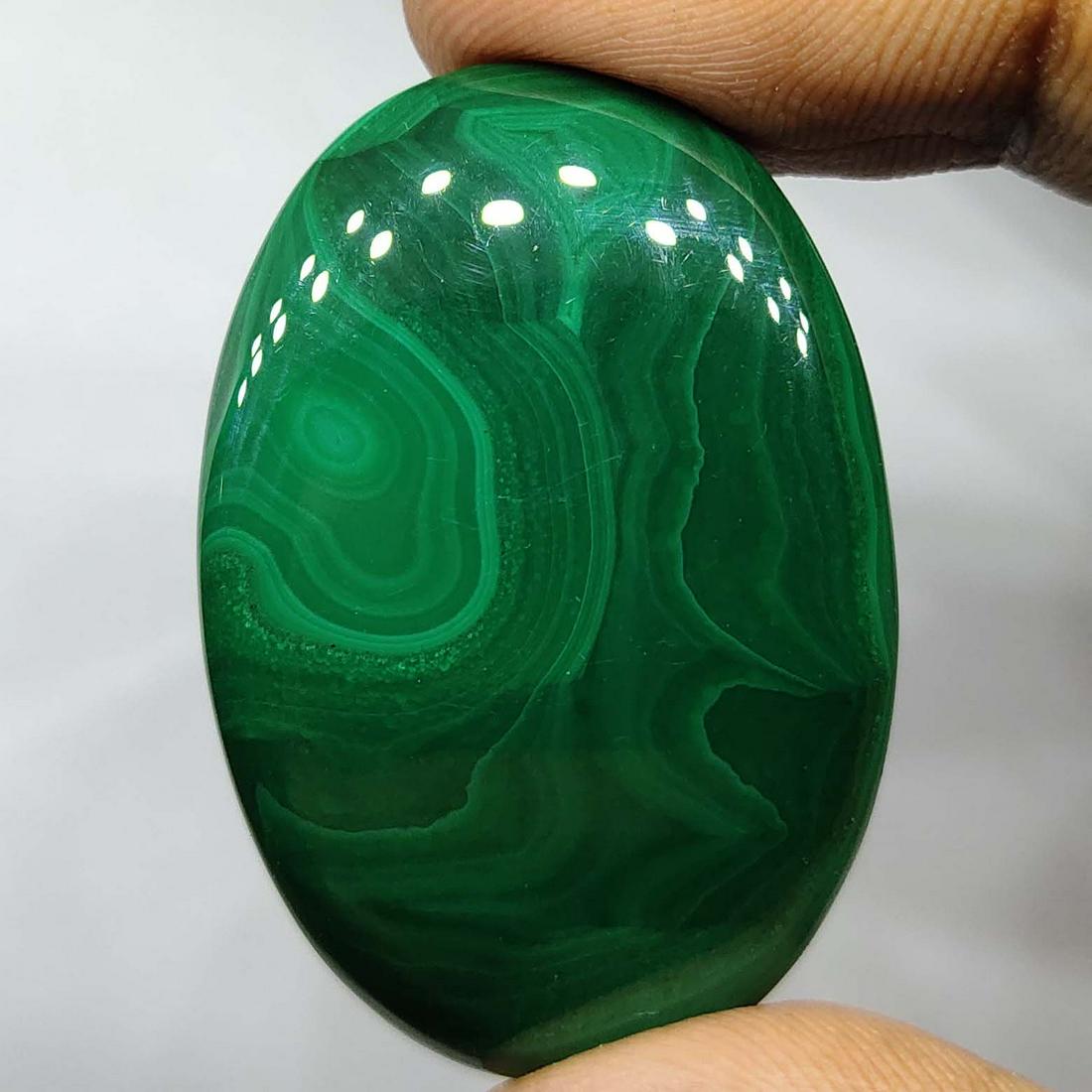 70.5 ct Natural Malachite: Natural Malachite with an exact weight is 70.5 ct.Top Quality stone