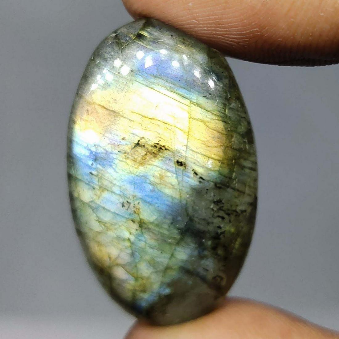27.35 ct Natural Multi Color Labradorite: Natural Multi Color Labradorite with an exact weight is 27.35 ct.Top Quality stone