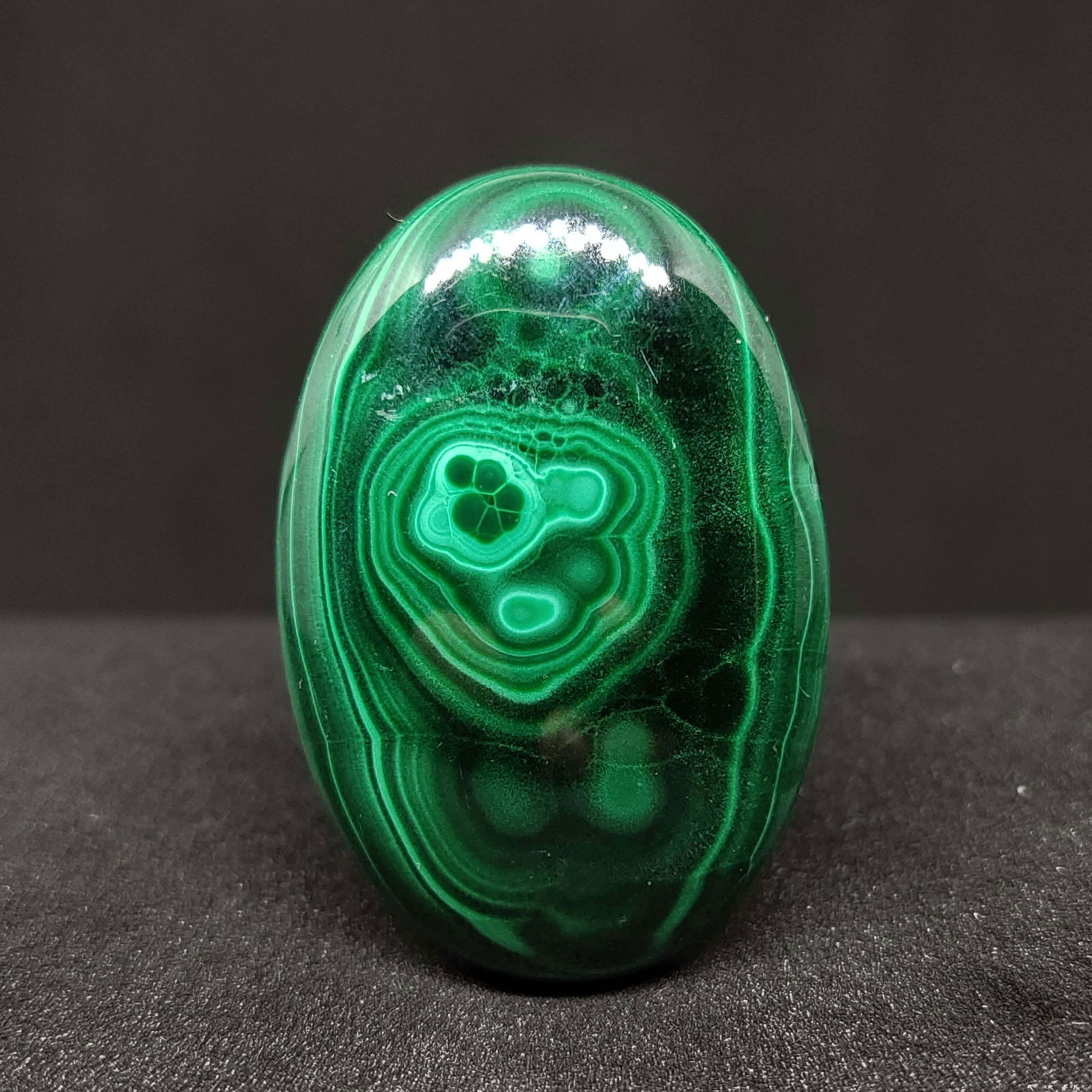 55.8 ct Natural Malachite: Natural Malachite with an exact weight is 55.8 ct.Top Quality stone