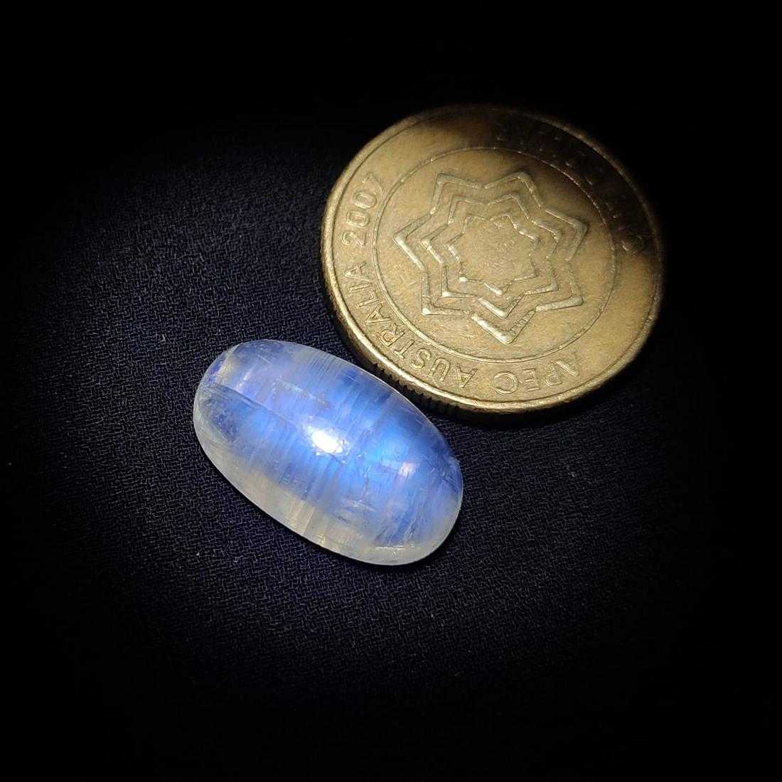 14.30 ct Natural White Rainbow Moonstone: Natural White Rainbow Moonstone with an exact weight is 14.30 ct.Top Quality stone