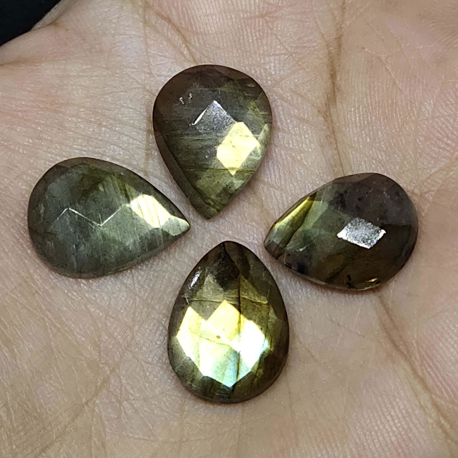 26.60 ct Natural 4 Pieces Faceted Labradorite: Natural 4 Pieces Faceted Labradorite with an exact weight is 26.60 ct.Top Quality stone