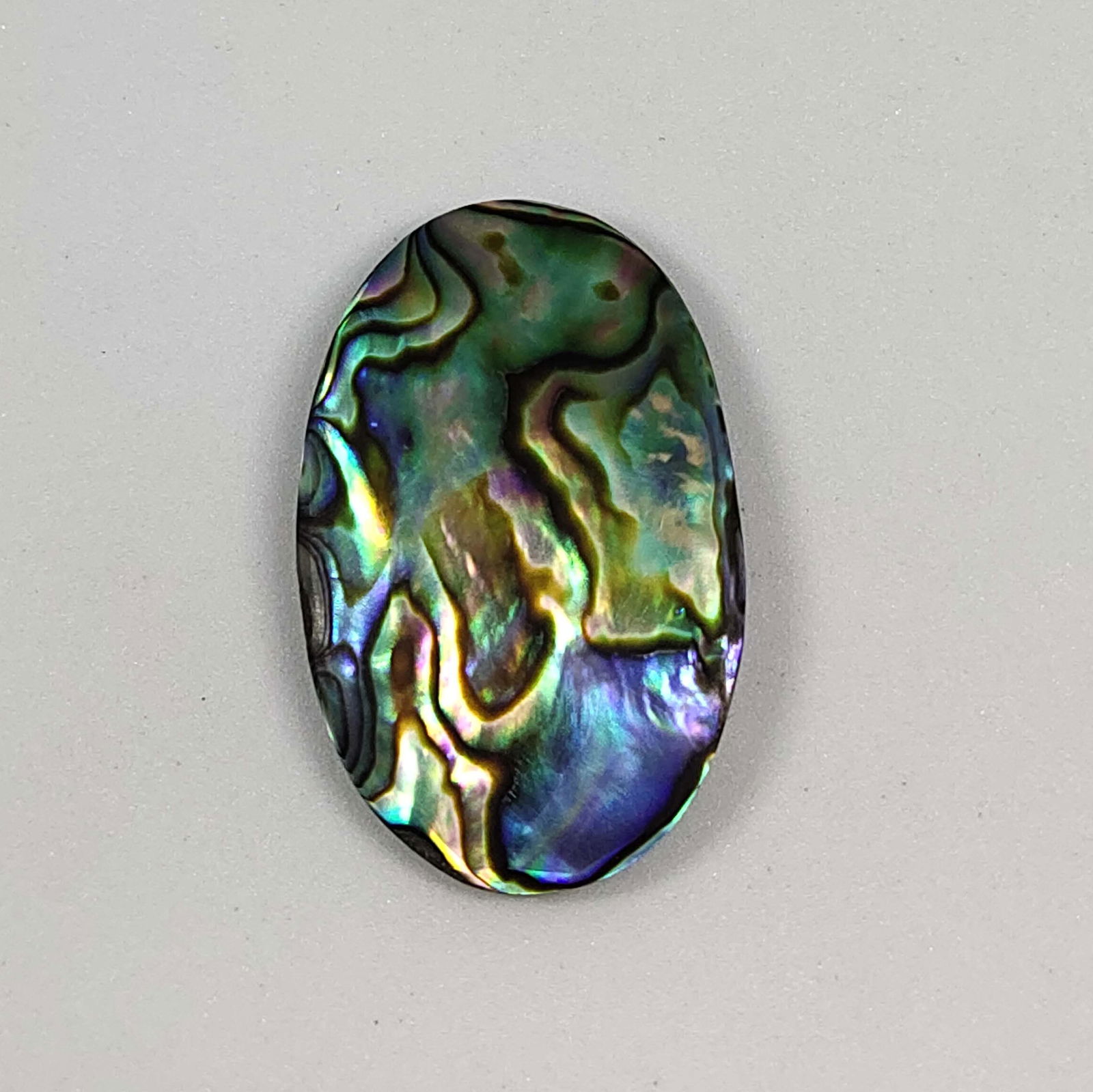 19.15 ct Natural Abalone Shell: Natural Abalone Shell with an exact weight is 19.15 ct.Top Quality stone