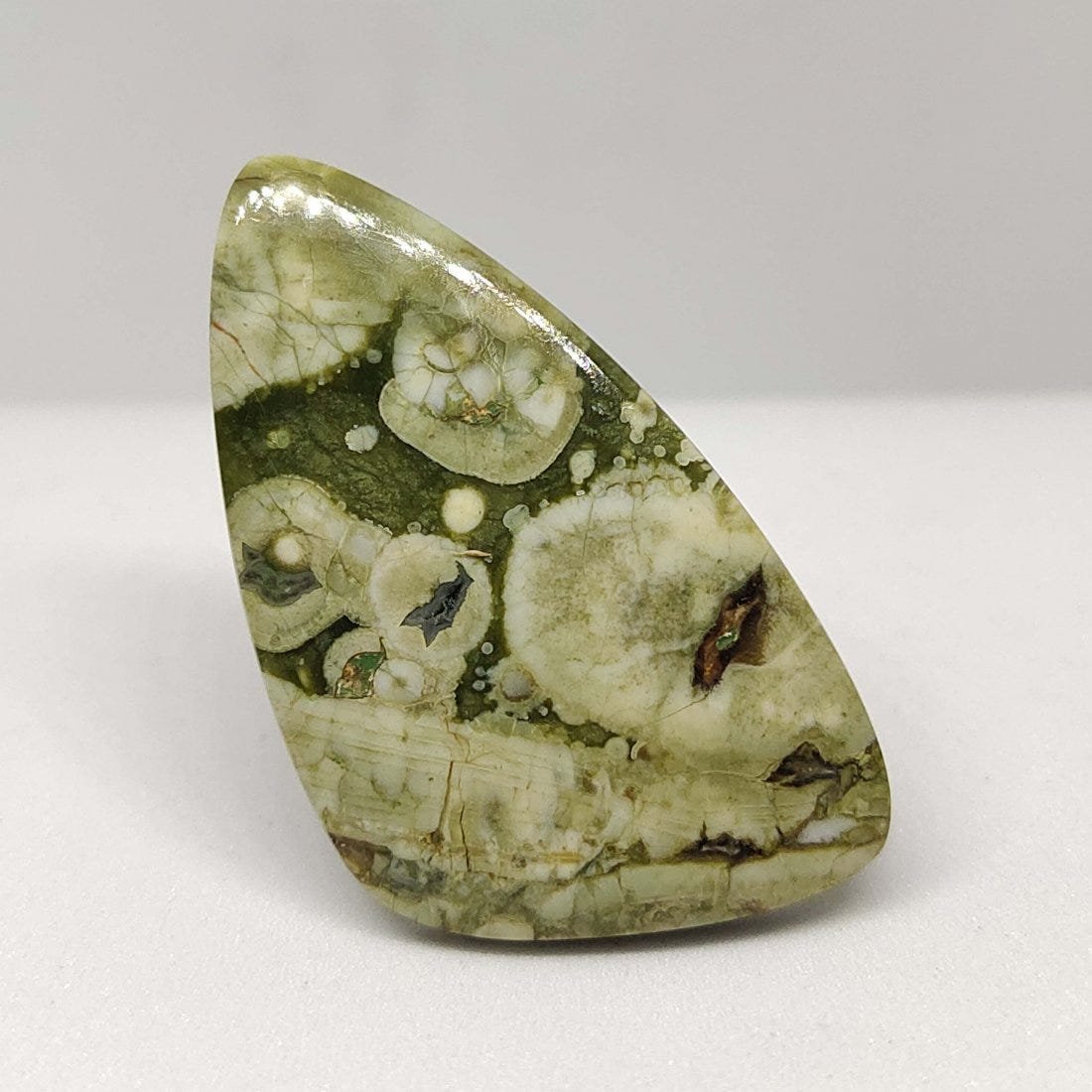 28.50 ct Natural Rain Forest Rhyolite Jasper: All the stones listed are 100% natural and rarely selected from a big quantity lot also these are of very high quality. BID WITH CONFIDENCE!!! DIMENSIONS : 38X22X4 mm