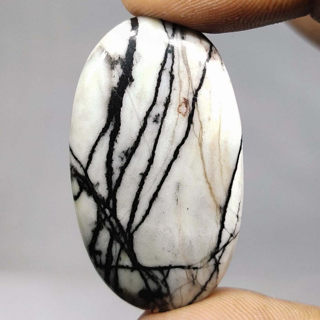 51.40 ct Natural Zebra Jasper: All the stones listed are 100% natural and rarely selected from a big quantity lot also these are of very high quality. BID WITH CONFIDENCE!!! DIMENSIONS : 39.5X23X6.5 mm