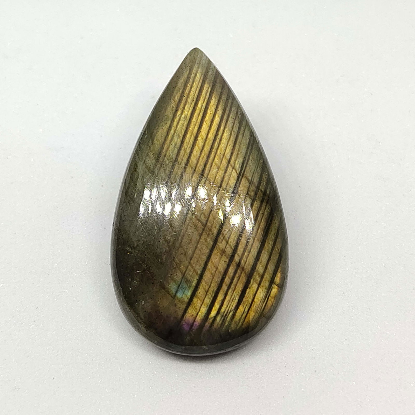 44.20 ct Natural Multi Labradorite: All the stones listed are 100% natural and rarely selected from a big quantity lot also these are of very high quality. BID WITH CONFIDENCE!!! DIMENSIONS : 37X21X7 mm