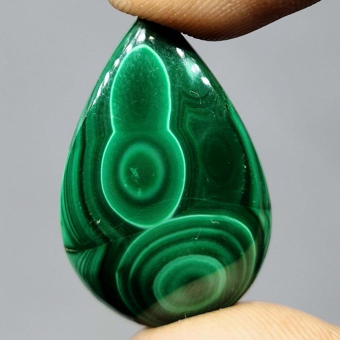 27.15 ct Top Grade Natural Malachite: All the stones listed are 100% natural and rarely selected from a big quantity lot also these are of very high quality. BID WITH CONFIDENCE!!! DIMENSIONS : 28X18X4 mm