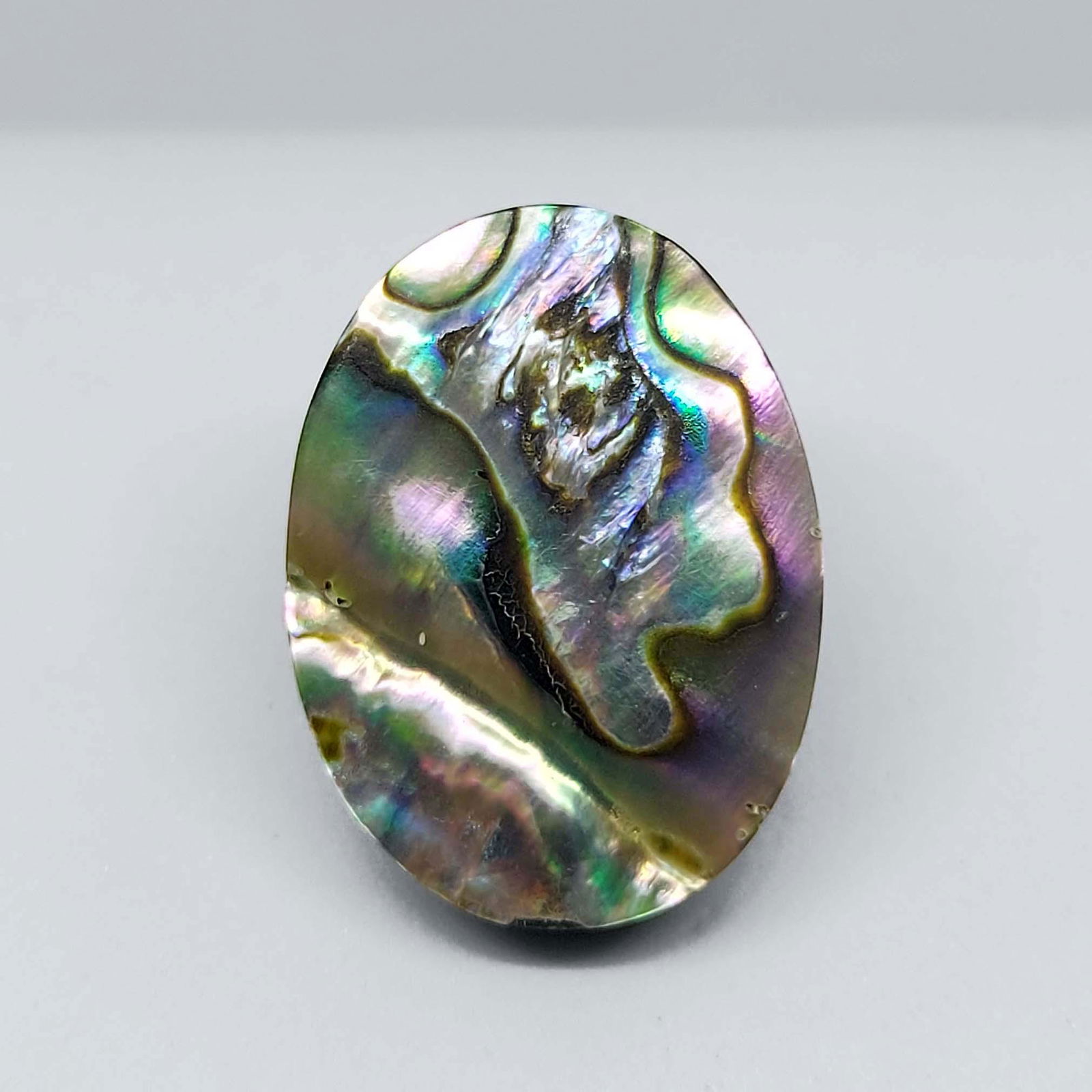 23.80 ct Natural Abalone Shell: All the stones listed are 100% natural and rarely selected from a big quantity lot also these are of very high quality. BID WITH CONFIDENCE!!! DIMENSIONS : 26X19X6 mm