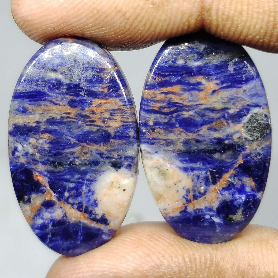 35.25 ct Natural Sodalite Pair: All the stones listed are 100% natural and rarely selected from a big quantity lot also these are of very high quality. BID WITH CONFIDENCE!!! DIMENSIONS : 27X16X4 mm