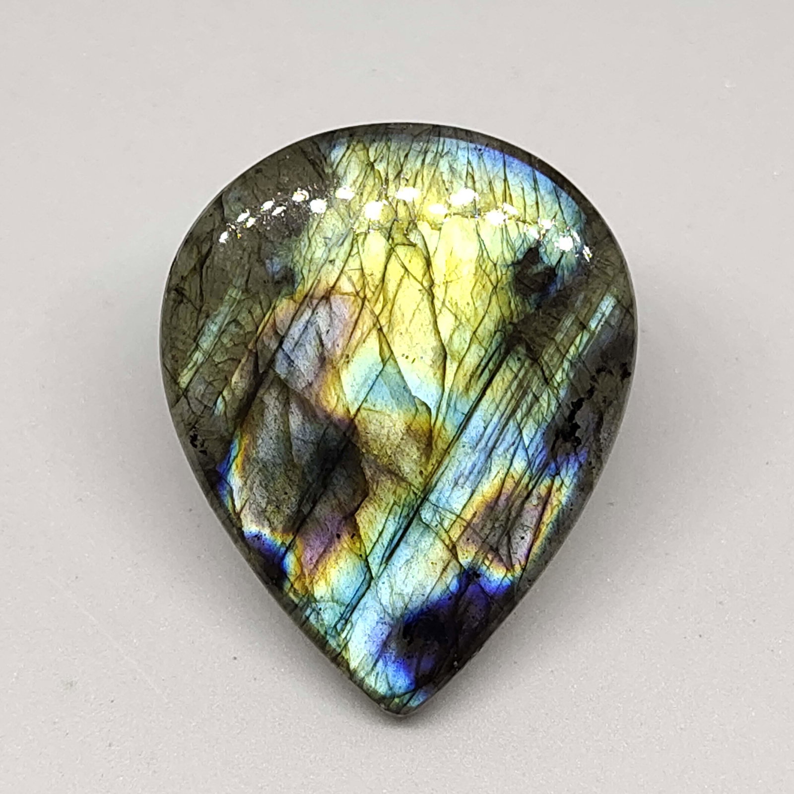 46.20 ct Top Grade Natural Multi Labradorite: All the stones listed are 100% natural and rarely selected from a big quantity lot also these are of very high quality. BID WITH CONFIDENCE!!! DIMENSIONS : 32X26X6 mm