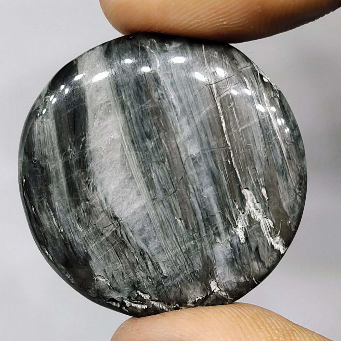 39.9 ct Natural Orthoceras Fossil: All the stones listed are 100% natural and rarely selected from a big quantity lot also these are of very high quality. BID WITH CONFIDENCE!!! DIMENSIONS : 29X29X5.6 mm