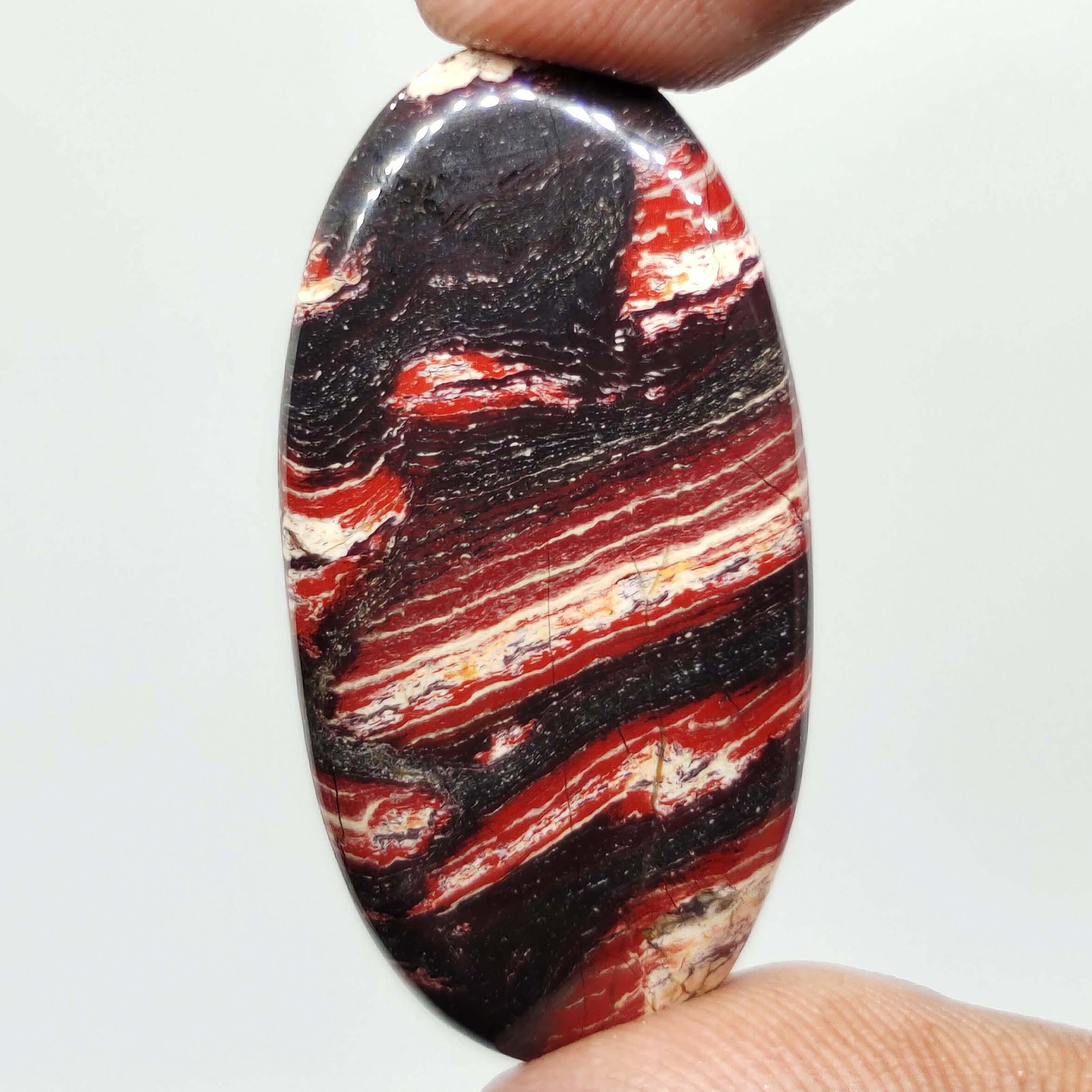50.75 ct Natural Snake Skin Jasper: All the stones listed are 100% natural and rarely selected from a big quantity lot also these are of very high quality. BID WITH CONFIDENCE!!! DIMENSIONS : 40X20X5.5 mm
