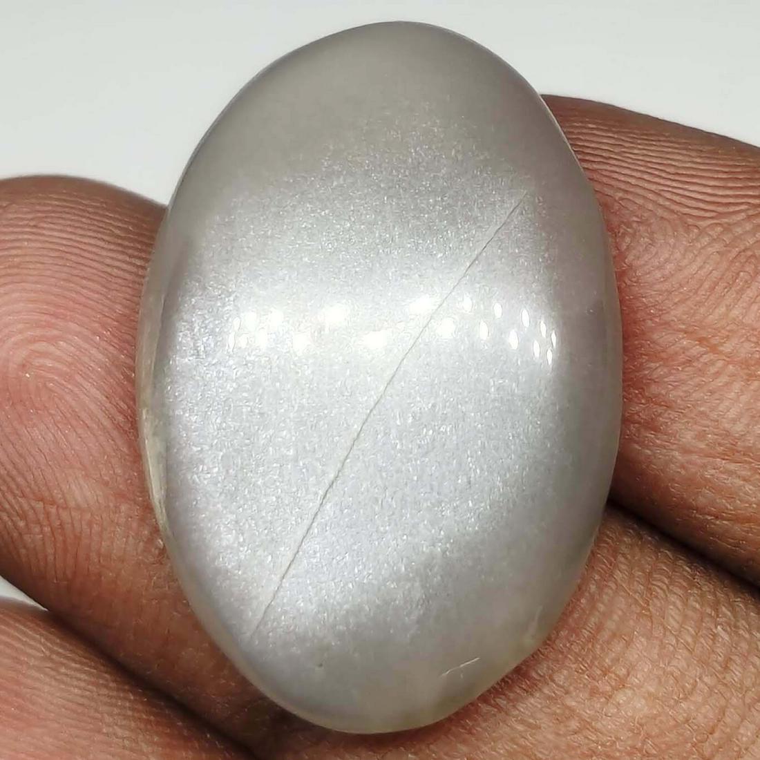 25.35 ct Top Grade Natural Grey Moonstone: All the stones listed are 100% natural and rarely selected from a big quantity lot also these are of very high quality. BID WITH CONFIDENCE!!! DIMENSIONS : 27X18X6 mm